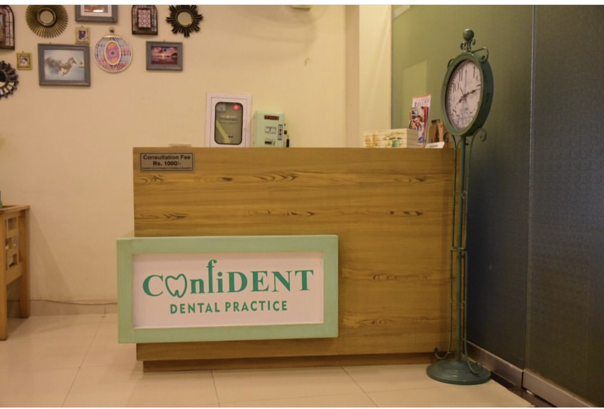 Front desk with ConfiDENT wordmark